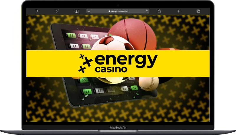 Energy Casino Sportwetten Banner auf einem Laptop mit Bällen und Quotenanzeige im Bereich für Pre Match und Langzeitwetten in Deutschland
